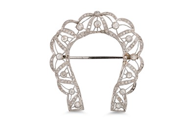 Lot 167 - AN EDWARDIAN DIAMOND HORSESHOE BROOCH, set...