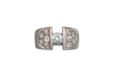 Lot 169 - A DIAMOND RING, the tension set brilliant cut...