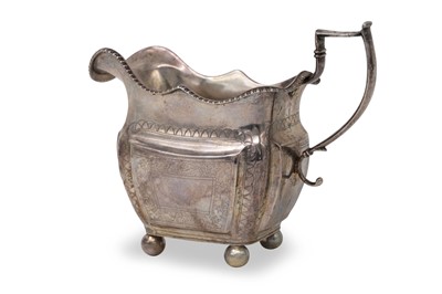 Lot 460 - A GEORGE III IRISH SILVER MILK JUG, Dublin...