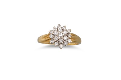 Lot 455 - A DIAMOND CLUSTER RING, the brilliant cut...
