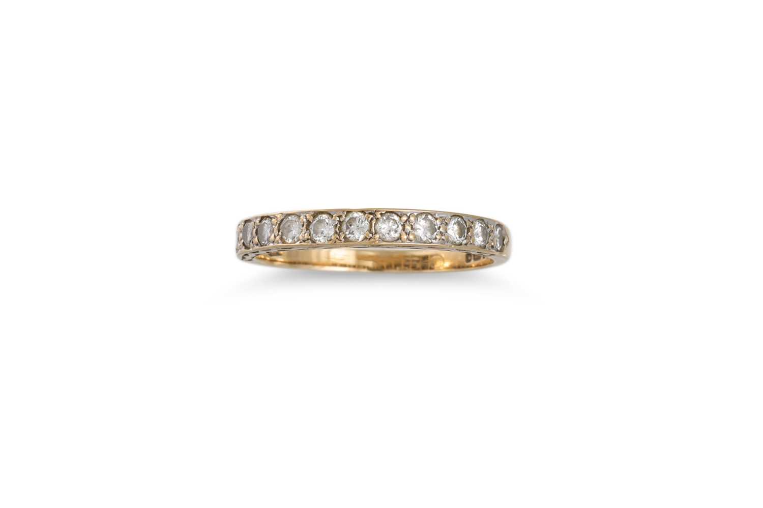 Lot 13 - A DIAMOND HALF ETERNITY RING, the round...