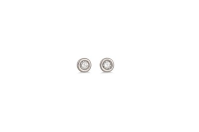 Lot 66 - A PAIR OF DIAMOND STUD EARRINGS, collet set,...