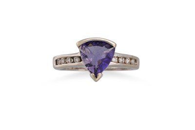 Lot 80 - A DIAMOND AND TANZANITE RING, the triangular...