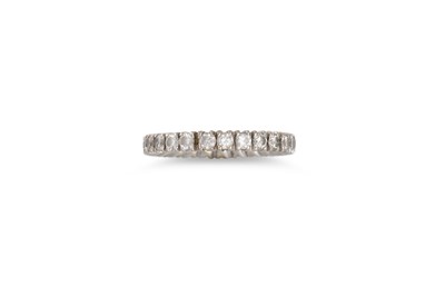 Lot 394 - A DIAMOND ETERNITY RING, the brilliant cut...