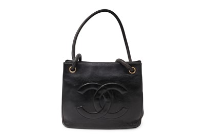 Lot 574 - A CHANEL BLACK LEATHER SHOULDER BAG, embossed...
