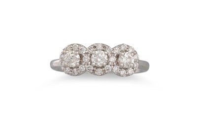 Lot 175 - A DIAMOND TRIPLE CLUSTER RING, the brilliant...