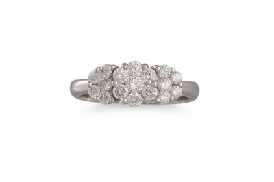 Lot 176 - A DIAMOND TRIPLE CLUSTER RING, the brilliant...