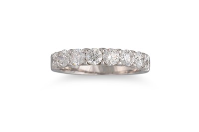 Lot 180 - A DIAMOND HALF ETERNITY RING, the round...