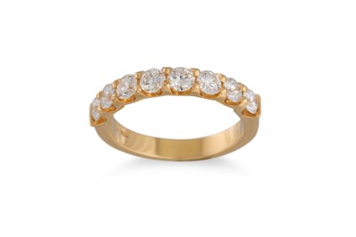Lot 221 - A DIAMOND HALF ETERNITY RING, the round...