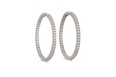 Lot 227 - A PAIR OF DIAMOND SET HOOP EARRINGS, set with...