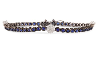 Lot 235 - A SAPPHIRE AND DIAMOND LINE BRACELET, the...
