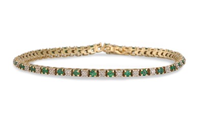 Lot 287 - AN EMERALD AND DIAMOND LINE BRACELET, mounted...
