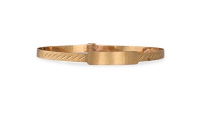 Lot 55 - A 9CT GOLD CHILD'S ID BANGLE, 2.9 g.