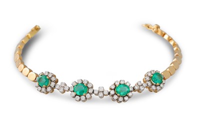 Lot 145 - A DIAMOND AND EMERALD BRACELET, comprising...