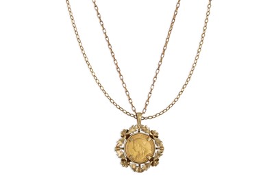 Lot 125 - A HALF SOVEREIGN MOUNTED PENDANT, together...