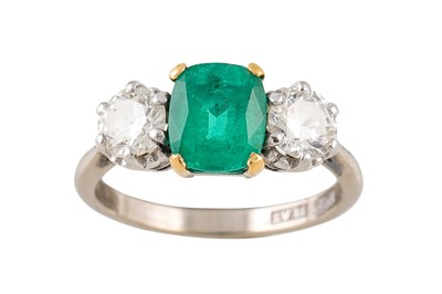 Lot 364 - AN EMERALD AND DIAMOND THREE STONE RING,...