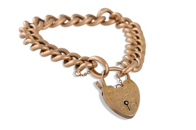 Lot 3 - A 9CT ROSE GOLD CURB LINK BRACELET AND PADLOCK,...
