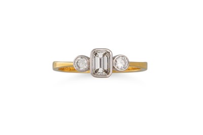 Lot 144 - A THREE STONE DIAMOND RING, set with an...