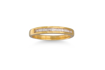 Lot 159 - A DIAMOND HALF ETERNITY RING, the baguette cut...