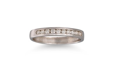 Lot 165 - A DIAMOND HALF ETERNITY RING, the brilliant...
