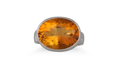 Lot 348 - A CITRINE RING, the oval citrine to diamond...