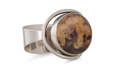 Lot 93 - A MODERN IRISH STONE SET SILVER BANGLE, maker...