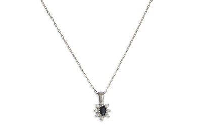 Lot 370 - A SAPPHIRE AND DIAMOND CLUSTER PENDANT,...