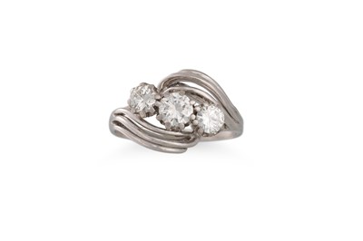 Lot 385 - A THREE STONE DIAMOND RING, of twist form, the...