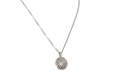 Lot 194 - A DIAMOND SET PENDANT, mounted in 9ct white...