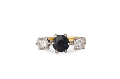 Lot 448 - A SAPPHIRE AND DIAMOND THREE STONE RING,...