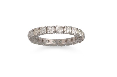 Lot 312 - A DIAMOND ETERNITY RING, the old cut diamonds...