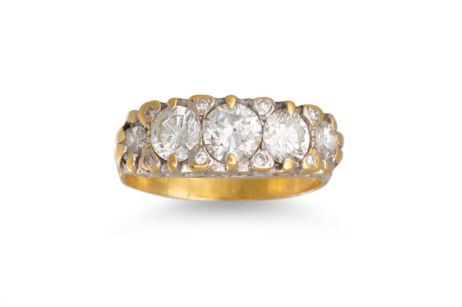 Lot 11 - A FIVE STONE DIAMOND RING, the circular...