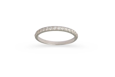 Lot 450 - A DIAMOND HALF HOOP ETERNITY RING, set with...