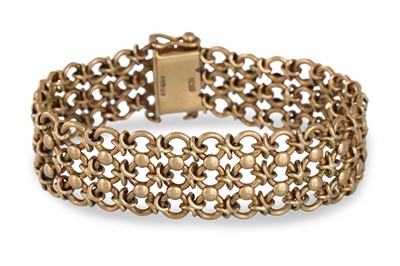 Lot 69 - A 9CT YELLOW GOLD CUFF BRACELET, 33 g.