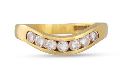 Lot 6 - A DIAMOND SEVEN STONE WISHBONE RING, in 18ct...