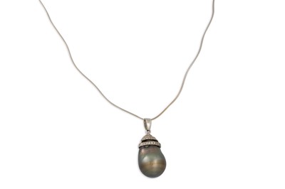 Lot 129 - A BAROQUE BLACK PEARL AND DIAMOND PENDANT, in...