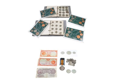 Lot 449 - TWO ALBUMS OF MOSTLY IRISH COINS, FOUR 'EIRE'...