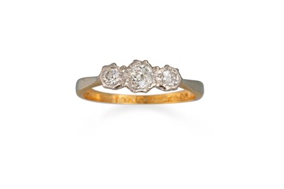 Lot 8 - A DIAMOND THREE STONE RING, the brilliant cut...