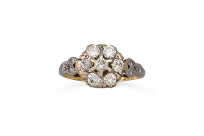 Lot 9 - A DIAMOND CLUSTER RING, the brilliant cut...