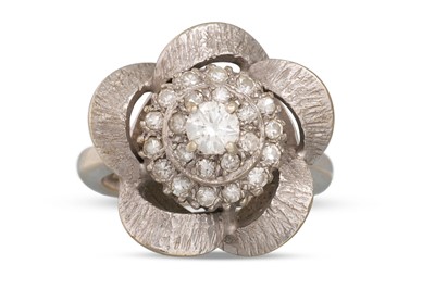 Lot 242 - A 1970'S DIAMOND SET CLUSTER RING, textured...