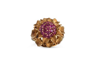 Lot 243 - A MID CENTURY RUBY CLUSTER RING, stylised...