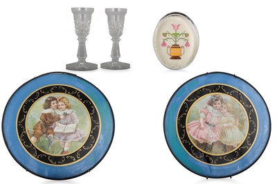 Lot 563 - A PAIR OF EDWARDIAN CIRCULAR COLOURED GLASS...