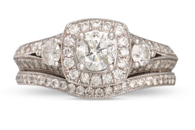 Lot 420 - A DIAMOND CLUSTER RING, the brilliant cut...