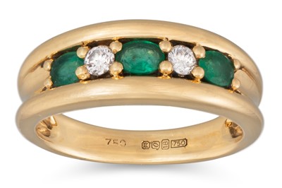 Lot 12 - AN EMERALD AND DIAMOND RING, mounted in yellow...
