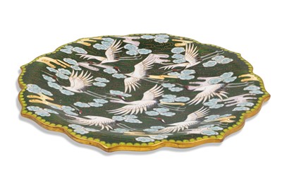 Lot 602 - A JAPANESE PLATE DEPICTING CRANES, on a green...