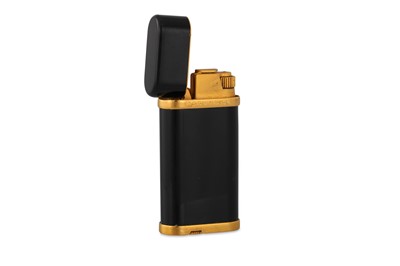 Lot 27 - A CARTIER LIGHTER, black enamel and gilt