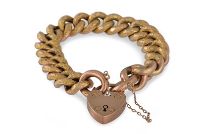 Lot 35 - AN ANTIQUE 9CT GOLD CURB LINK BRACELET,...