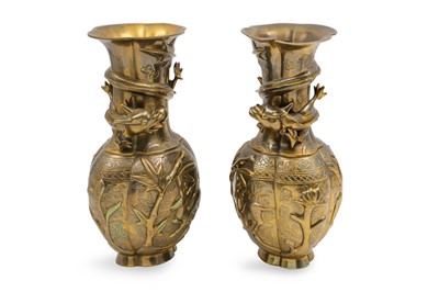 Lot 604 - A PAIR OF ORIENTAL STYLE BRASS VASES, cast...