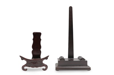 Lot 579 - A CHINESE CARVED HARDWOOD PLATE STAND, and...