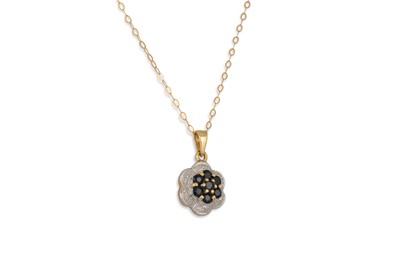 Lot 22 - A DIAMOND AND SAPPHIRE CLUSTER PENDANT,...